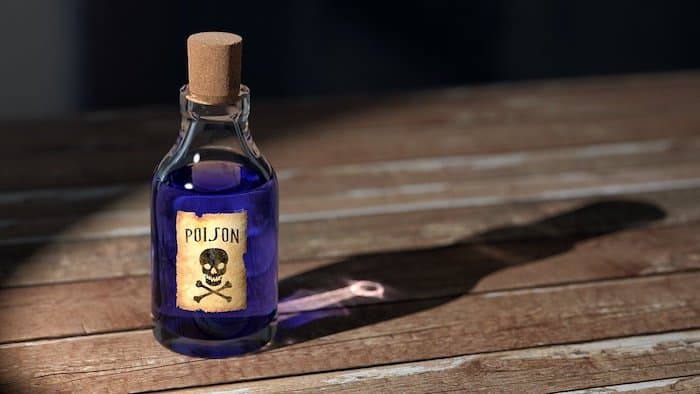 Photo of a bottle of poison with an ominous skull and bones label