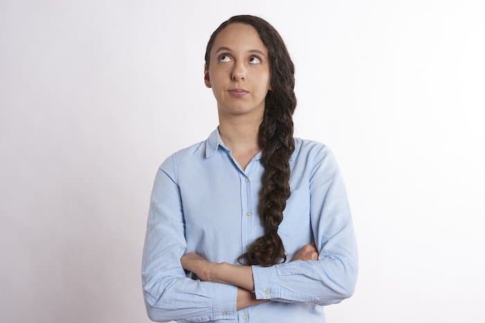 Woman rolling her eyes